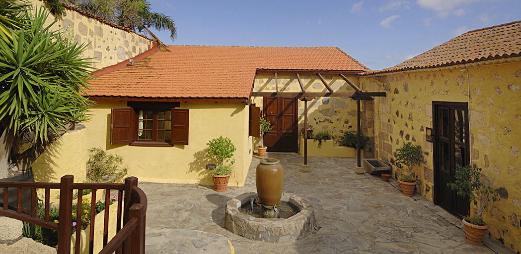 Bougainvillea cottage and frangi[ani cottage courtyard, La Bodega Casa Rural, Tenerife